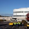 Airport personnel having a meeting outdoors